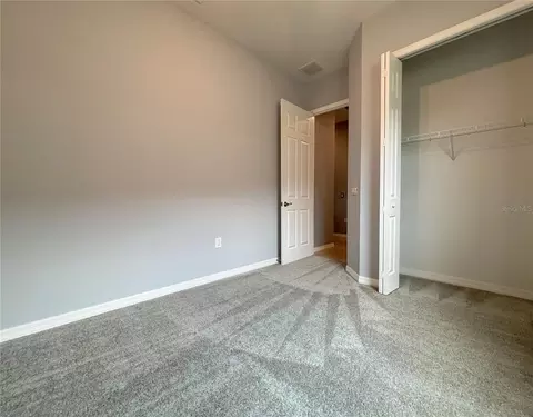Bedroom - 1124 Sawgrass Dr, Winter Haven, FL 33884 photo 3 of 7