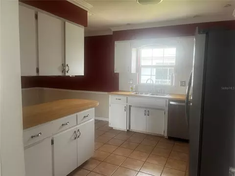 Kitchen - 108 Lagoon Rd, Winter Haven, FL 33884 photo 1 of 2