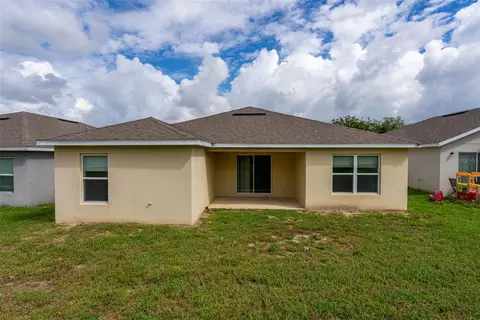 Exterior - 1333 Lucerne Loop Rd NE, Winter Haven, FL 33881 photo 4 of 5