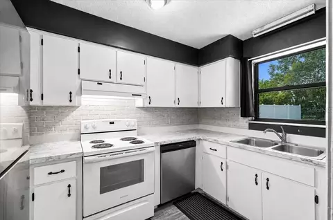 Kitchen - 905 S Orange Ave, Bartow, FL 33830 photo 1 of 12