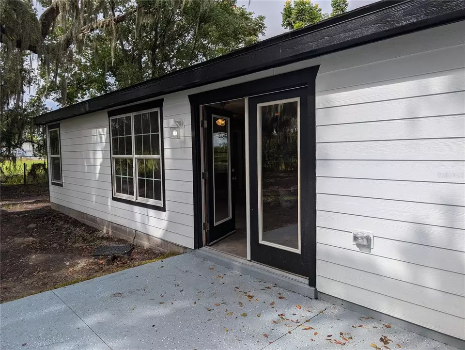 Exterior - 12022 SE Sunset Harbor Rd, Weirsdale, FL 32195 photo 2 of 3