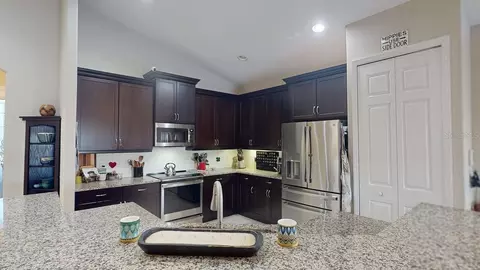 Kitchen - 12840 24th Street Cir E, Parrish, FL 34219 photo 5 of 5