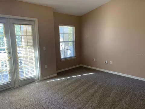 Living - 7117 Harmony Square Dr S #7117, Harmony, FL 34773 photo 7 of 7
