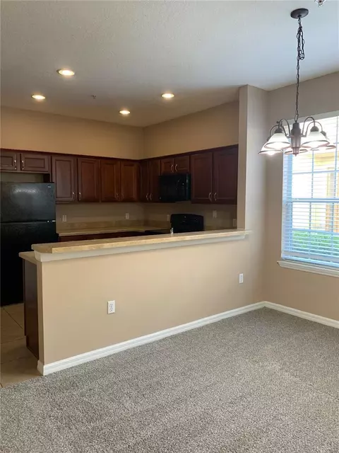 Kitchen - 7117 Harmony Square Dr S #7117, Harmony, FL 34773 photo 2 of 3