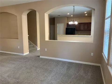 Living - 7117 Harmony Square Dr S #7117, Harmony, FL 34773 photo 1 of 7