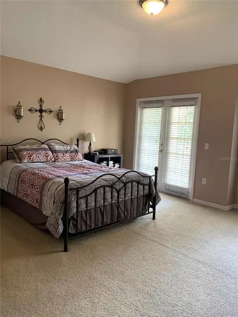 Bedroom - 7117 Harmony Square Dr S #7117, Harmony, FL 34773 photo 4 of 9