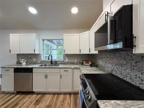 Kitchen - 30 Olive Circle Loop, Ocala, FL 34472 photo 2 of 2