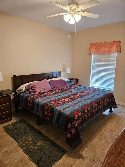 Bedroom - 5280 SW 88th Pl, Ocala, FL 34476 photo 2 of 3