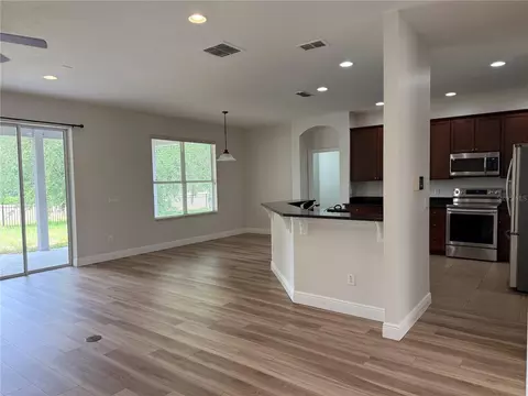 Living - 345 Beacon Pointe Dr, Ocoee, FL 34761 photo 10 of 16