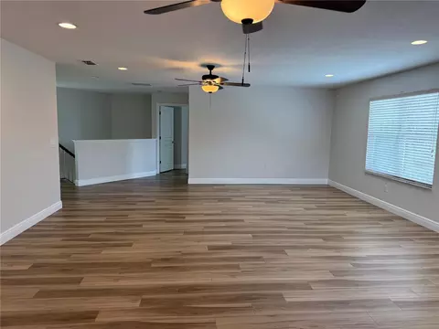 Living - 345 Beacon Pointe Dr, Ocoee, FL 34761 photo 14 of 16