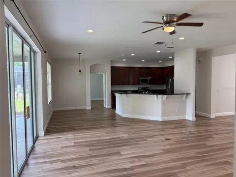 Living - 345 Beacon Pointe Dr, Ocoee, FL 34761 photo 9 of 16