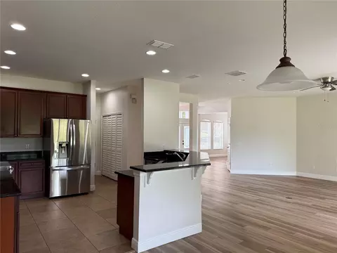 Living - 345 Beacon Pointe Dr, Ocoee, FL 34761 photo 11 of 16