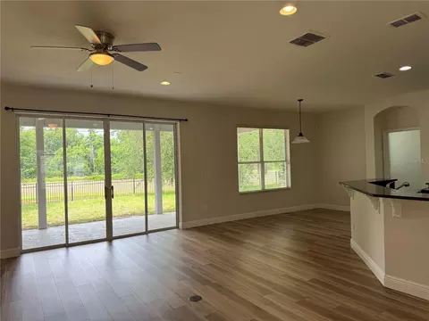 Living - 345 Beacon Pointe Dr, Ocoee, FL 34761 photo 8 of 16