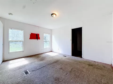 Bedroom - 21420 NE 41st St, Williston, FL 32696 photo 8 of 11