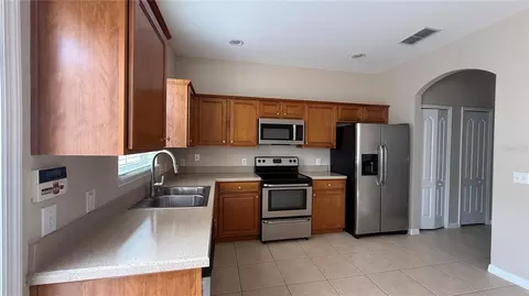 Kitchen - 7108 Five Oaks Dr, Harmony, FL 34773 photo 1 of 3