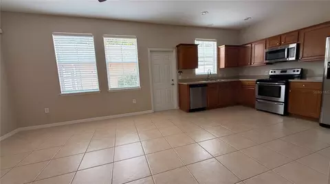 Living - 7108 Five Oaks Dr, Harmony, FL 34773 photo 6 of 7