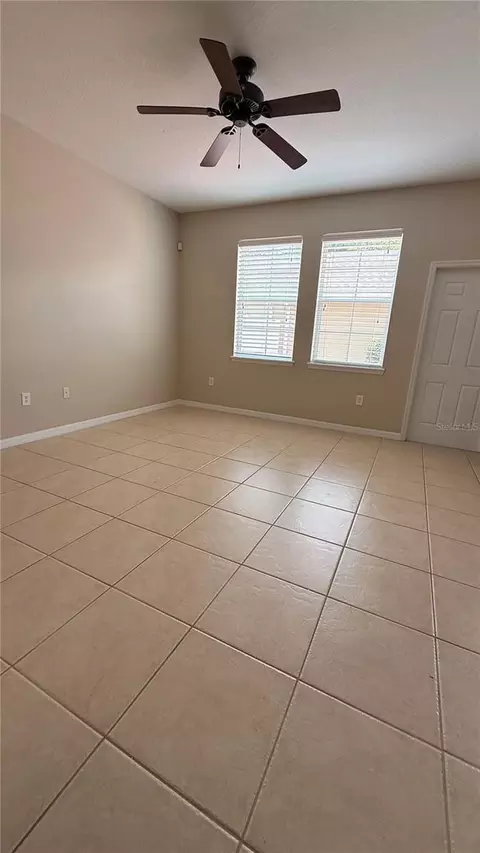 Living - 7108 Five Oaks Dr, Harmony, FL 34773 photo 7 of 7