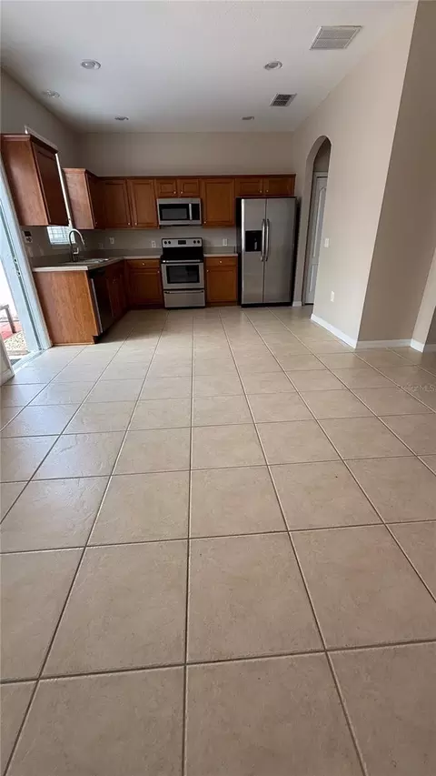 Kitchen - 7108 Five Oaks Dr, Harmony, FL 34773 photo 2 of 3