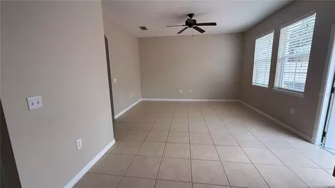 Living - 7108 Five Oaks Dr, Harmony, FL 34773 photo 3 of 7