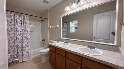 Bath - 7108 Five Oaks Dr, Harmony, FL 34773 photo 1 of 7