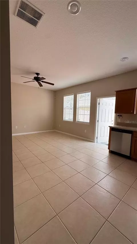 Living - 7108 Five Oaks Dr, Harmony, FL 34773 photo 5 of 7