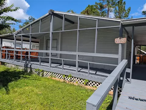 Exterior - 24304 Maxwell St, Astor, FL 32102 photo 4 of 6
