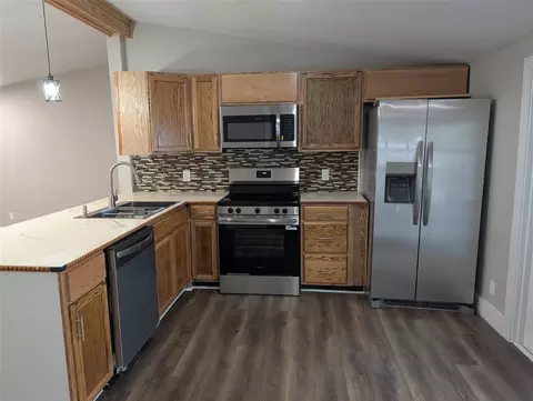 Kitchen - 24304 Maxwell St, Astor, FL 32102 photo 2 of 2
