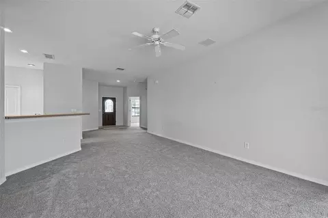 Living - 16614 Lazy Breeze Loop, Clermont, FL 34714 photo 4 of 4