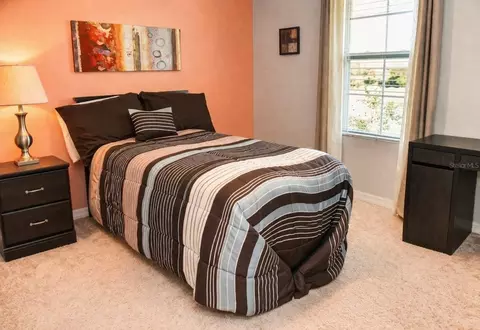 Bedroom - 4800 Riverwalk Dr, Saint Cloud, FL 34771 photo 4 of 5