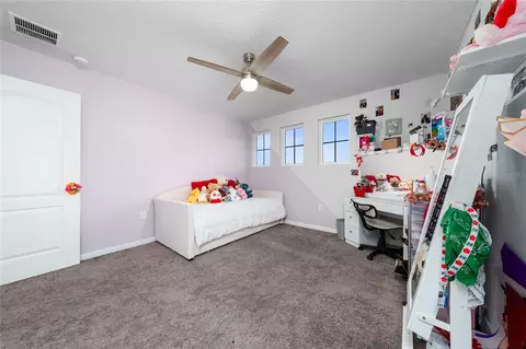 Bedroom - 1663 Gentle Breeze Dr, Saint Cloud, FL 34771 photo 6 of 6