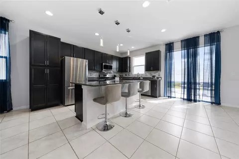 Kitchen - 1663 Gentle Breeze Dr, Saint Cloud, FL 34771 photo 2 of 2