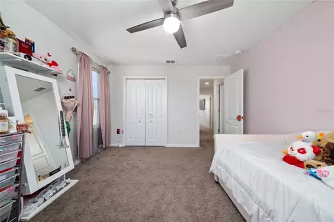 Bedroom - 1663 Gentle Breeze Dr, Saint Cloud, FL 34771 photo 3 of 6