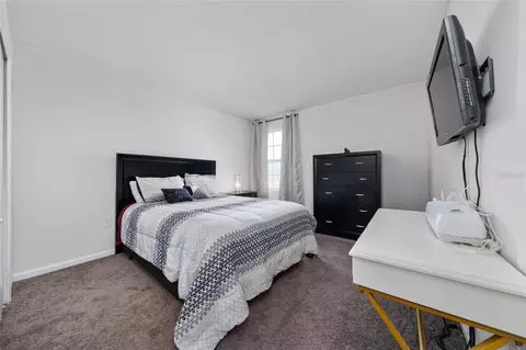 Bedroom - 1663 Gentle Breeze Dr, Saint Cloud, FL 34771 photo 4 of 6
