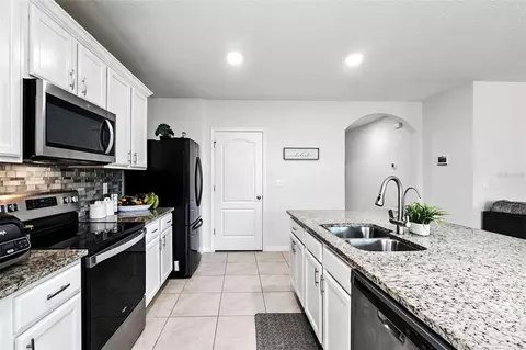 Kitchen - 5396 Hickory Downs Way, Saint Cloud, FL 34771 photo 3 of 7