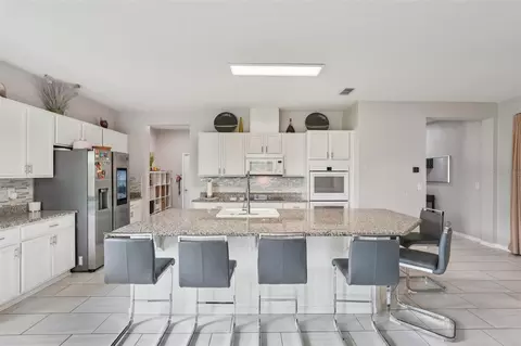 Kitchen - 4569 Baler Trails Dr, Saint Cloud, FL 34772 photo 3 of 4