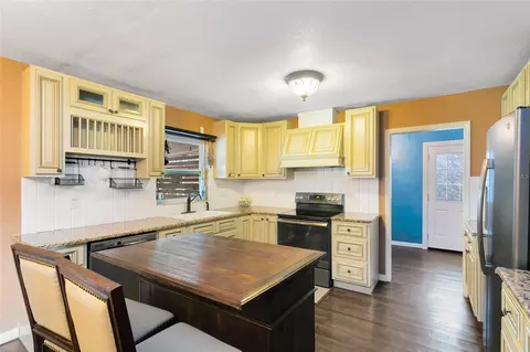 Kitchen - 1412 Cypress Ave, Saint Cloud, FL 34769 photo 2 of 3