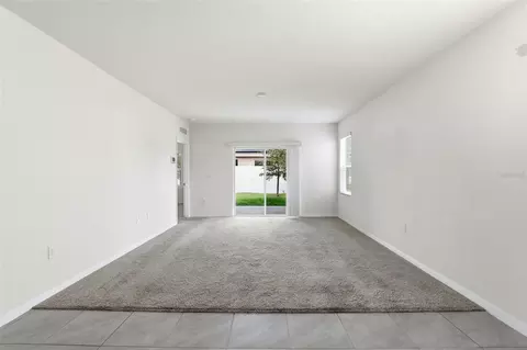 Living - 6777 Huntleigh Hammock Rd, Harmony, FL 34773 photo 1 of 3