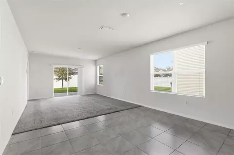 Living - 6777 Huntleigh Hammock Rd, Harmony, FL 34773 photo 2 of 3