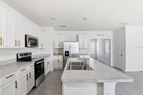Kitchen - 6777 Huntleigh Hammock Rd, Harmony, FL 34773 photo 2 of 4