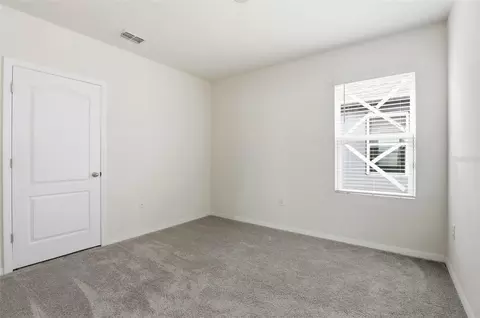 Bedroom - 6777 Huntleigh Hammock Rd, Harmony, FL 34773 photo 3 of 6