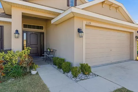 Exterior - 1129 Legatto Loop, Dundee, FL 33838 photo 3 of 6