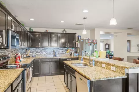 Kitchen - 4071 Flowering Peach Ln, Saint Cloud, FL 34772 photo 3 of 5