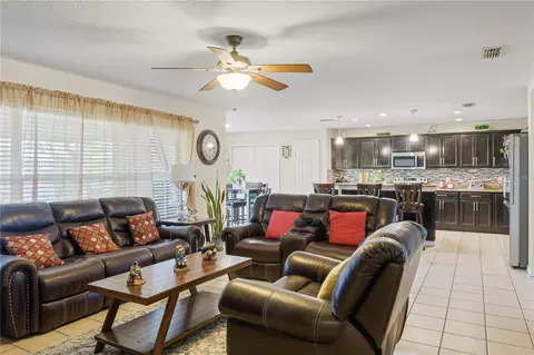 Living - 4071 Flowering Peach Ln, Saint Cloud, FL 34772 photo 5 of 6