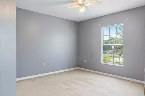 Bedroom - 4071 Flowering Peach Ln, Saint Cloud, FL 34772 photo 2 of 11