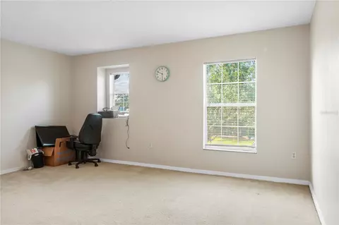 Bedroom - 4071 Flowering Peach Ln, Saint Cloud, FL 34772 photo 4 of 11