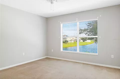 Bedroom - 4071 Flowering Peach Ln, Saint Cloud, FL 34772 photo 10 of 11