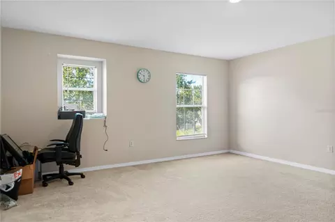 Bedroom - 4071 Flowering Peach Ln, Saint Cloud, FL 34772 photo 5 of 11