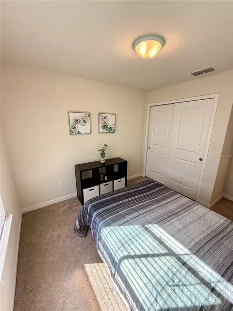 Bedroom - 10923 Leafshore Loop, Orlando, FL 32829 photo 3 of 10