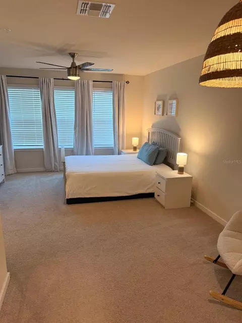 Bedroom - 10923 Leafshore Loop, Orlando, FL 32829 photo 5 of 10