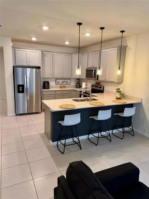 Kitchen - 10923 Leafshore Loop, Orlando, FL 32829 photo 2 of 3